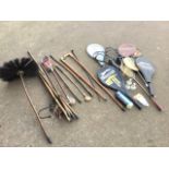 A set of old cane chimney sweep rods with brush; a quantity of miscellaneous tennis/badminton/squash