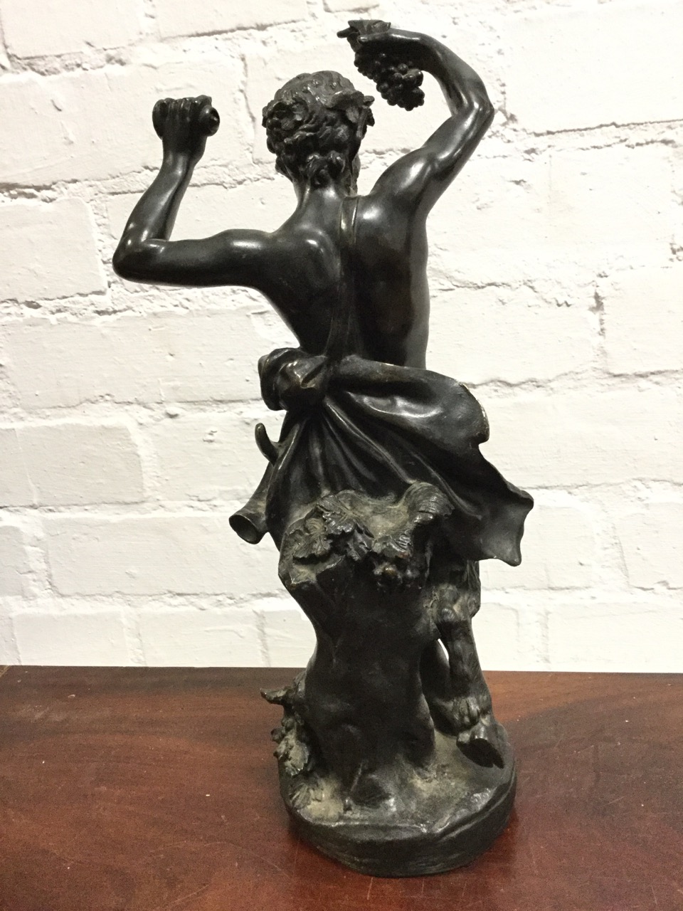 Nineteenth century bronze, Bacchus holding fruit & pestle aloft with acorn and oakleaf loincloth, - Image 3 of 3