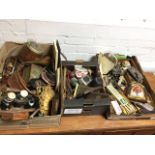 Three boxes of miscellaneous items including a copper hunting horn, oak shields, thimbles, ephemera,