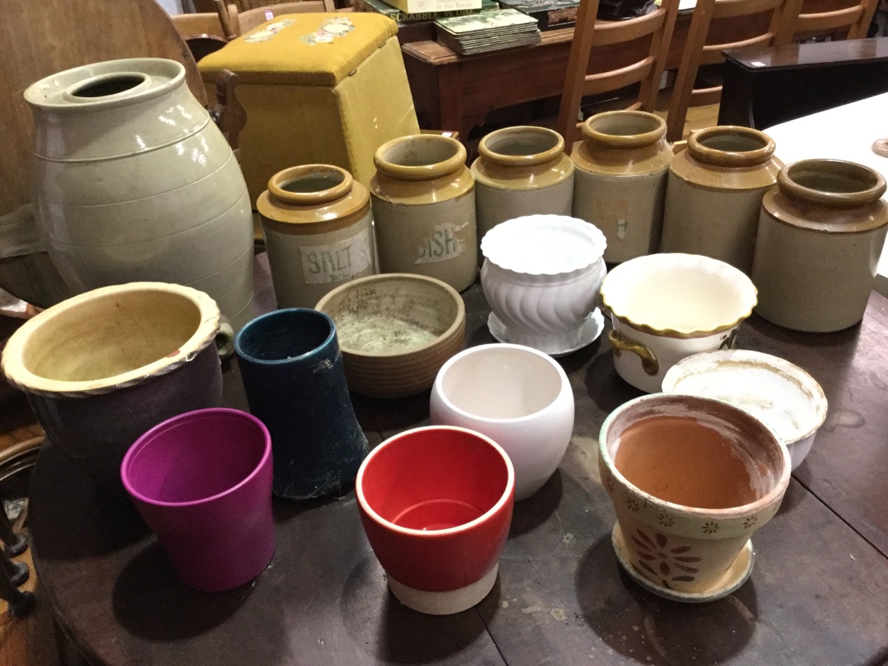 A set of six Victorian tubular stoneware salt glazed storage jars with moulded rims; a Victorian