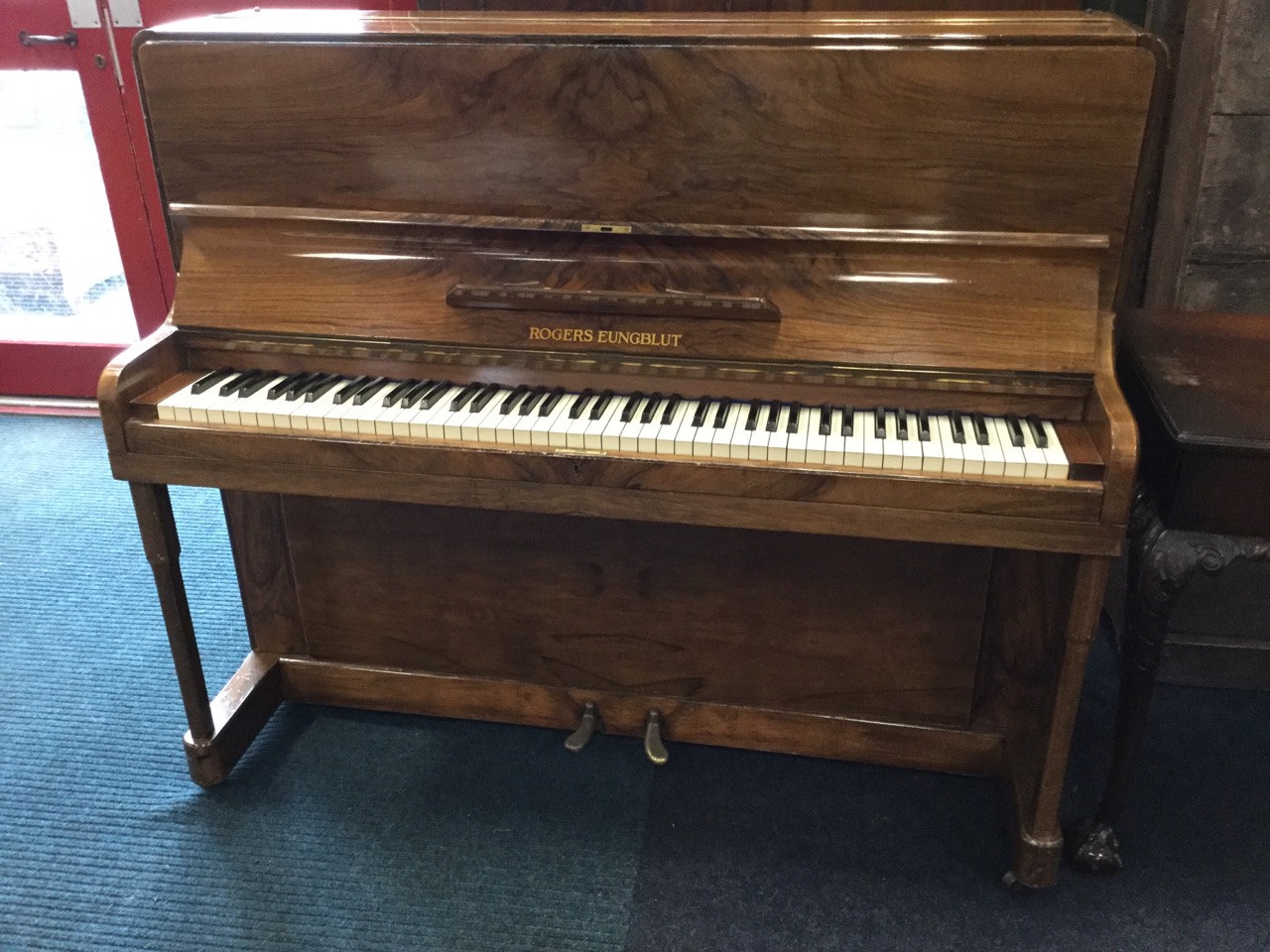 A 1930s walnut upright piano by Rogers Eungblut, with rounded case and seven octave keyboard - Image 3 of 3