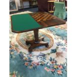 A William IV rosewood turn-over-top games table, the twin leaves with canted corners having interior
