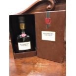 A boxed bottle of Buchanans Red Seal scotch whisky, the scroll embossed bottle sealed. (9.5in box)
