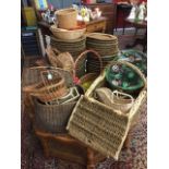 Miscellaneous canework including 43 basketwork placemats/platters, a fishing creel, picnic