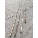 An Abu Atlantic Zoom beachcaster rod; two other fibreglass sea fishing rods; and an Abu 14ft two-