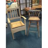 A slatback commode armchair with rounded platform arms raised on square column legs; and a kitchen