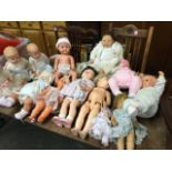 A collection of fourteen baby dolls, mainly late C20th century, including Rosebud, many with sleep