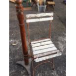 A Victorian pitch pine stand, the tapering turned column on cast iron tripod base - 31.5in; and a