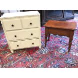 A Victorian mahogany stool with rectangular seat above scalloped aprons raised on angled baluster