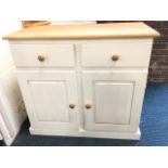 A contemporary painted cabinet with rectangular oak top above two drawers and two fielded panelled