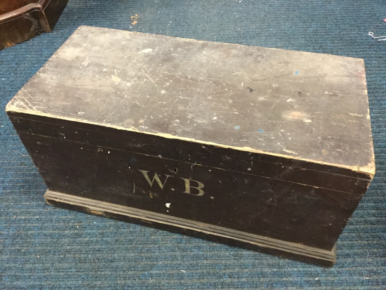 A lead workers pine toolbox of dovetailed construction on moulded plinth, containing interior tray