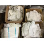 Four boxes of textiles - mainly white tablecloths, damask, napkins, embroidery, table covers,