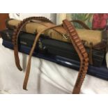 Two cartridge belts with leather mounts; two leather belts/straps; and three gun cases - one