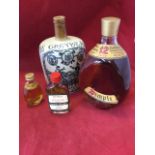 A vintage bottle of John Haig Dimple whisky - 75cl; a miniature 5cl bottle of Haig Dimple; an
