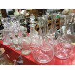 Two pairs of Edinburgh cut crystal decanters with ball stoppers; a set of five carafe style