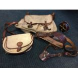 A Brady canvas twin-pocket fishing bag with leather mounts; a hardwood Nottingham style fishing reel