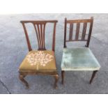 A period Chippendale style oak country chair with plain back rail above a pierced splat and