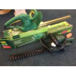 A boxed Gardenline electric hedge trimmer; and a Black & Decker GT220 hedge trimmer. (2)