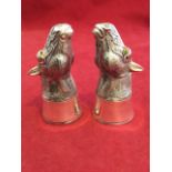 A pair of silver plated horsehead cruets, the finely detailed salt & pepperpots with inlaid yellow