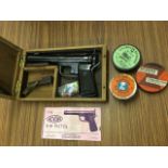 A boxed Avoke .177 air pistol, the gun with lever action complete with instruction manual, with