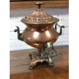 A Victorian copper samovar, the cover with fluting beneath handle, the urn with ribbed side