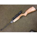 A Spanish Gamo .22 air rifle, the weapon with beech stock fitted with ProOptic 4 x 32 sights -