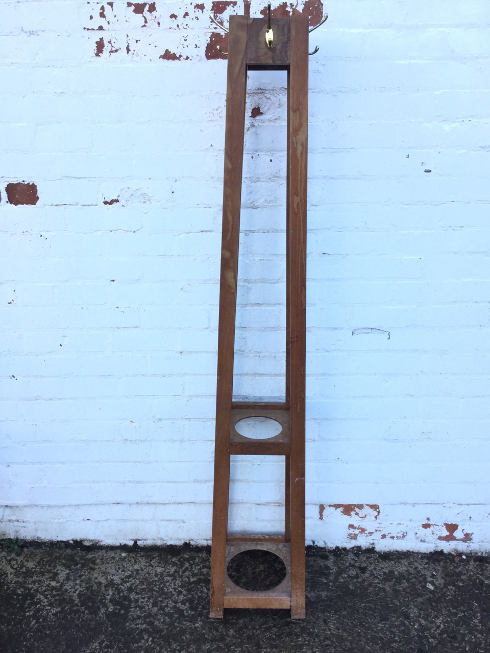 A square mahogany hatstand mounted with pegs, having angled rectangular legs joined by two platforms - Image 2 of 3