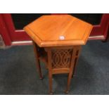 A late nineteenth century arts & crafts hexagonal occasional table, the moulded top on slender