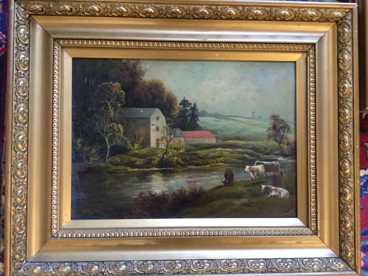 JB Russell, oils on boards, a pair, country river landscapes with figure with horse on bridge, - Image 2 of 3