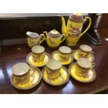 A Japanese six-pieces coffee set with coffee pot, sucrié and cream, all pieces enamelled with gilt