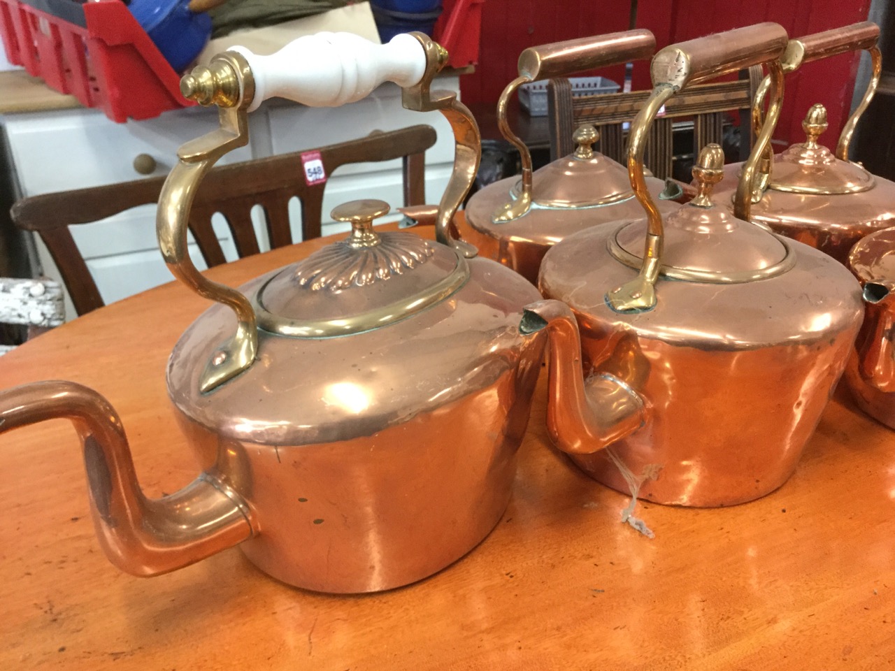 A collection of six Victorian copper kettles with riveted swan neck handles, oval & circular. (6) - Image 2 of 3