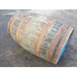 A 3ft oak barrel, the staves bound by six metal riveted strap bands. (36in)
