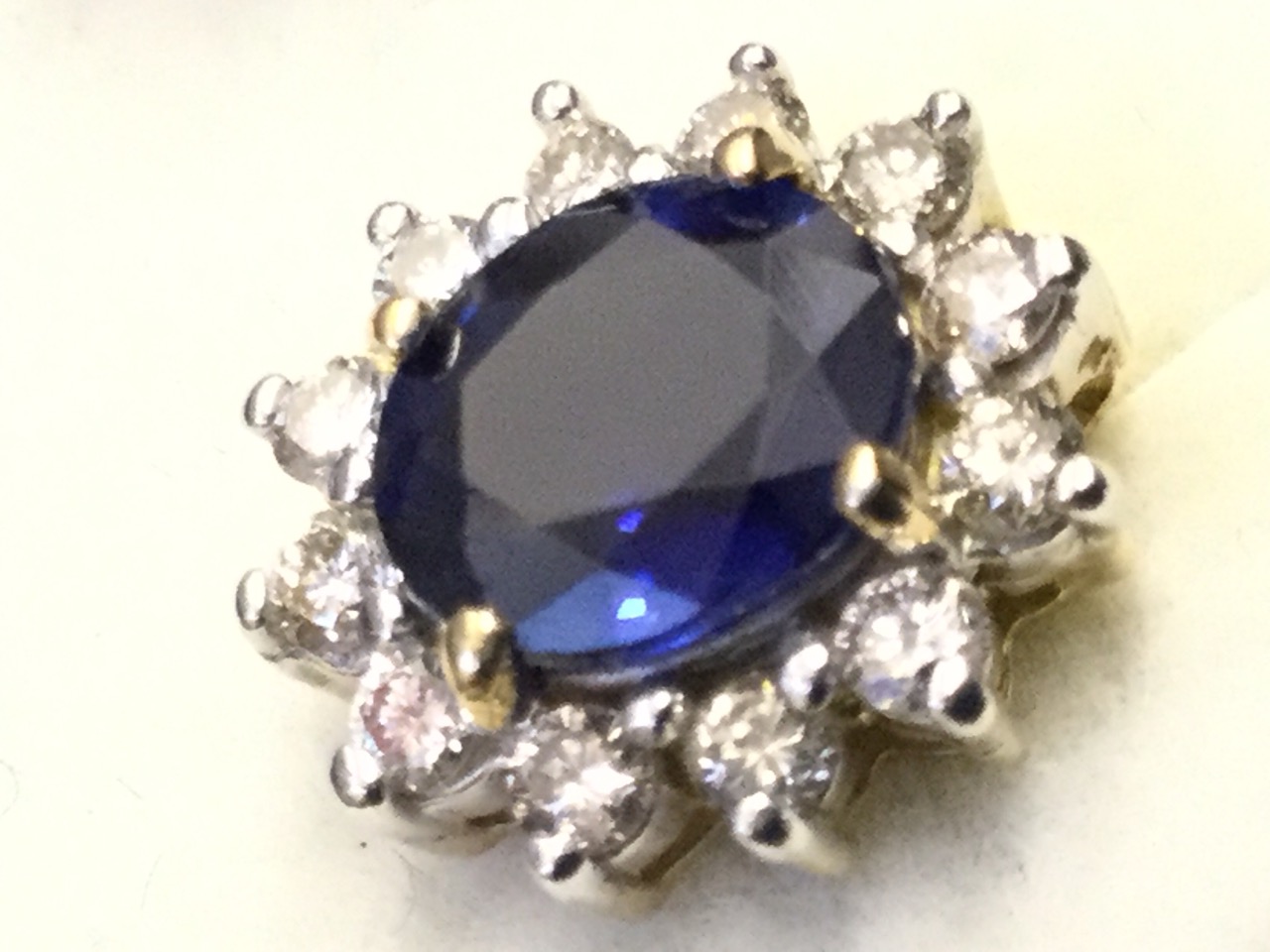 A pair of 18ct gold sapphire & diamond earrings, the oval claw set sapphires weighing just under - Image 2 of 3