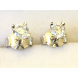 A pair of 18ct white gold diamond stud earrings, the circular claw set diamonds weighing approx
