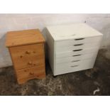 A melamine chest of six tray type drawers; and a faux pine chest of three drawers mounted with