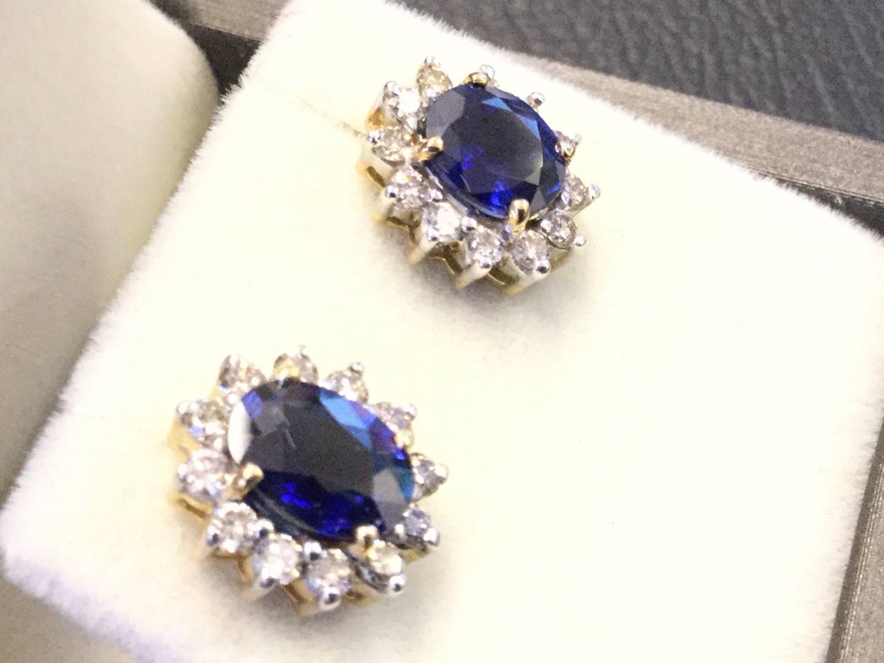 A pair of 18ct gold sapphire & diamond earrings, the oval claw set sapphires weighing just under - Image 3 of 3