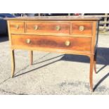 An Edwardian mahogany dressing table with rectangular moulded top above three cockbeaded drawers and