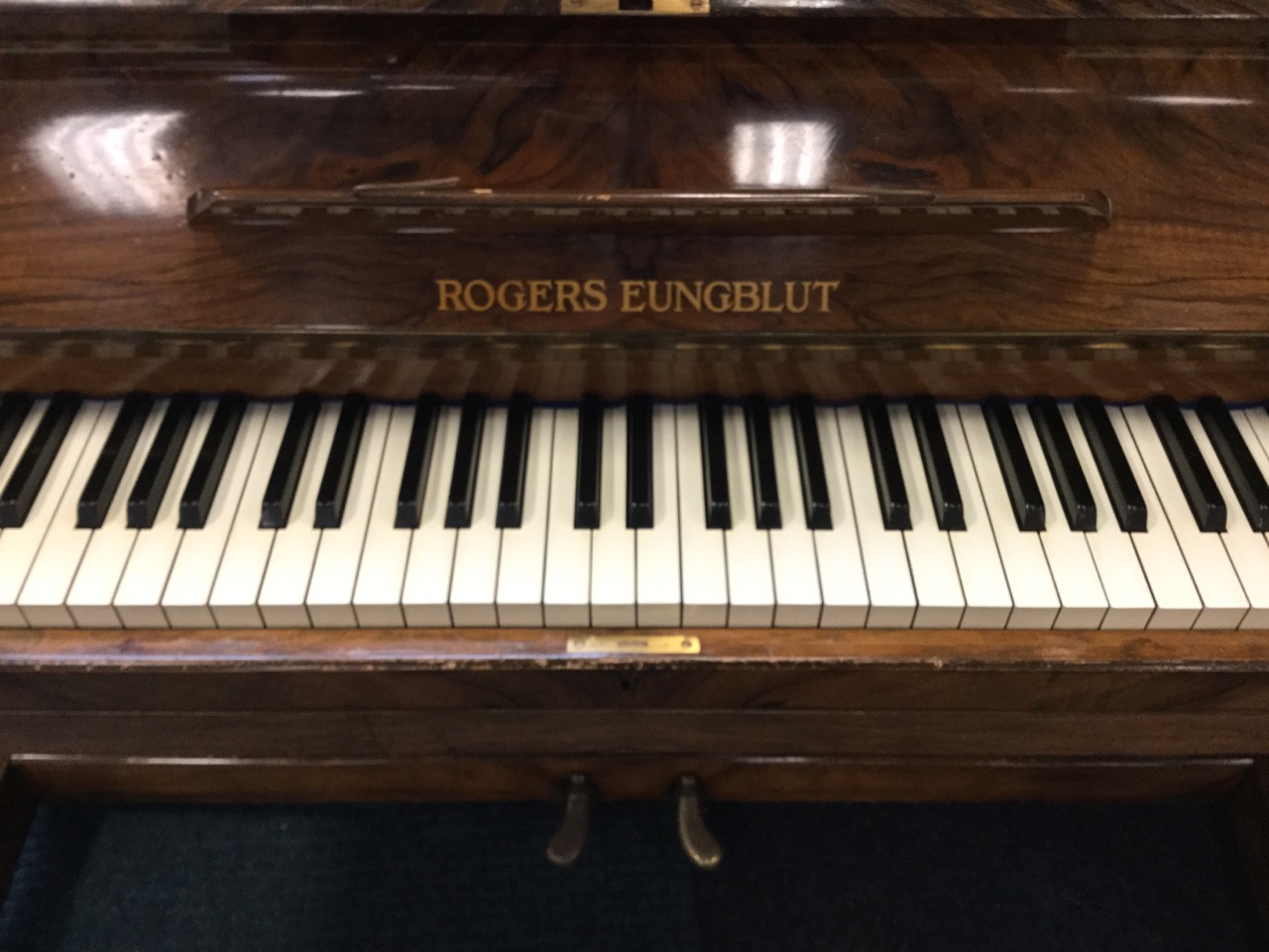 A 1930s walnut upright piano by Rogers Eungblut, with rounded case and seven octave keyboard - Image 2 of 3
