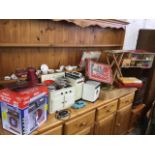 Miscellaneous childrens toys including a boxed Carlisle 50s dolls house, a tin kitchen cooker,