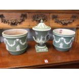 Three green jasperware pieces - a pair of jardinières with applied floral swagged decoration, and an