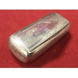 A Victorian silver snuff box having engine turned decoration to panels, the interior with silver