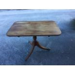 A small nineteenth century snap-top mahogany breakfast table, the single piece top with reeded