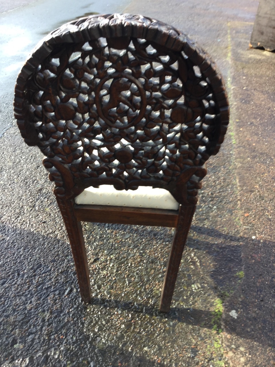 A pair of Victorian Anglo-Indian chairs, the oval backs carved with pierced floral decoration with - Image 3 of 3