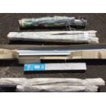 Six printed fabric blinds, removed from property with bars, bead pulleys, etc; and two unused