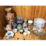 Miscellaneous oriental ceramics including ginger jars & covers, famile rose style, tea bowls, vases,