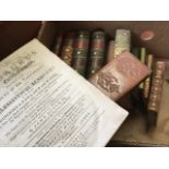 A quantity of antiquarian books including a 1754 England & Wales Thesaurus, a two volume leather