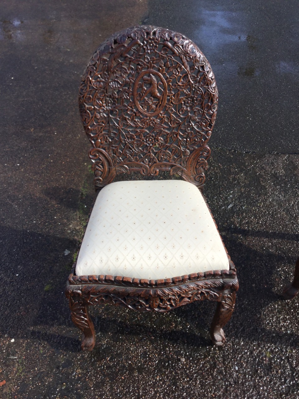 A pair of Victorian Anglo-Indian chairs, the oval backs carved with pierced floral decoration with - Image 2 of 3