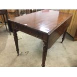 A George IV mahogany pembroke table, the top with ribbed edge having two rule-jointed drop flaps,