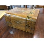 A Victorian walnut writing box with rounded top, inlaid with tonbridge bands framing mother-of-pearl