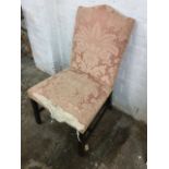 An eighteenth century style mahogany side chair, the upholstered camel back above a sprung seat,